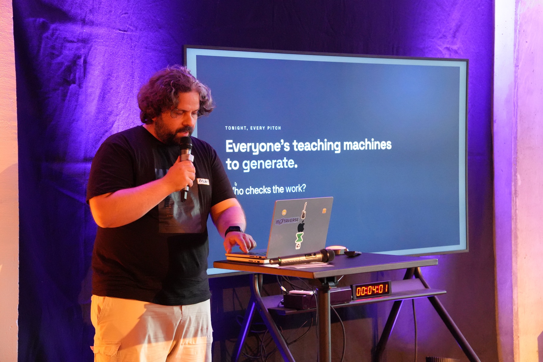 Ruslan Strazhnyk presenting QualityMax at Berlin SaaS Night